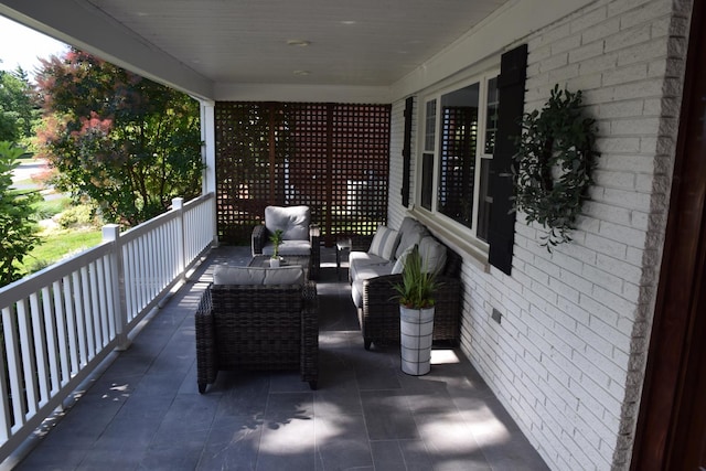 balcony with a porch and outdoor lounge area