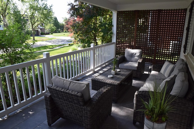 balcony featuring a porch