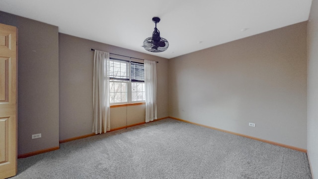 empty room featuring light colored carpet