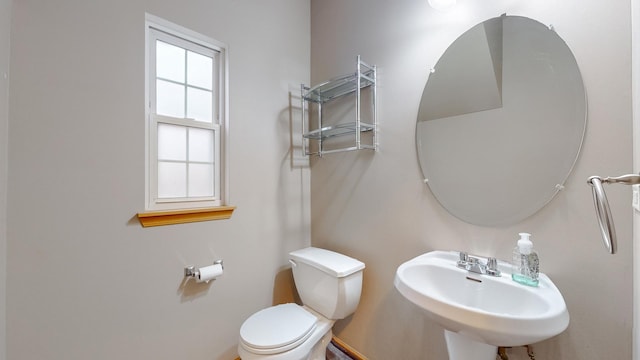 bathroom with sink and toilet