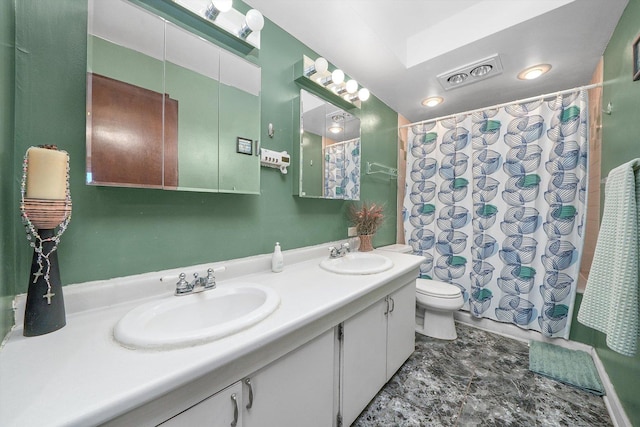 bathroom with vanity, toilet, and a shower with shower curtain