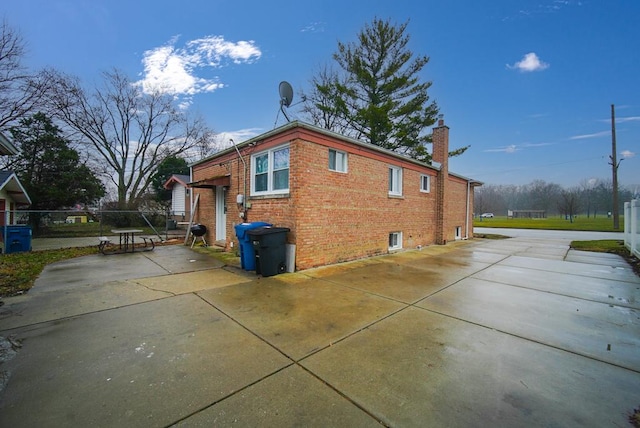 view of home's exterior featuring a patio