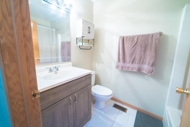 bathroom featuring vanity, toilet, curtained shower, and tile patterned flooring