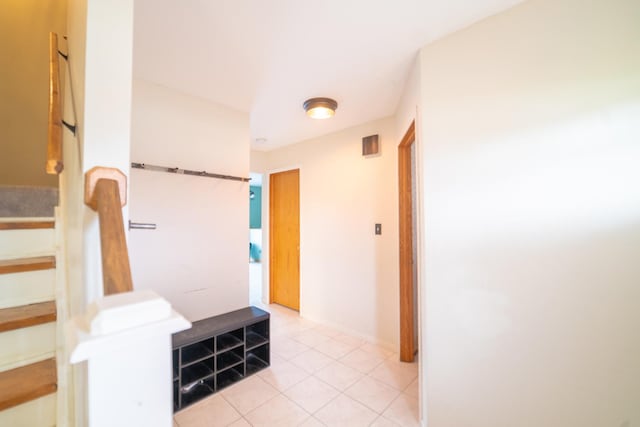 interior space featuring light tile patterned flooring