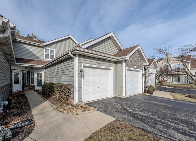 view of property exterior with a garage