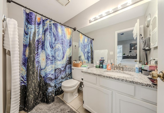 bathroom featuring vanity, toilet, curtained shower, and tile patterned flooring