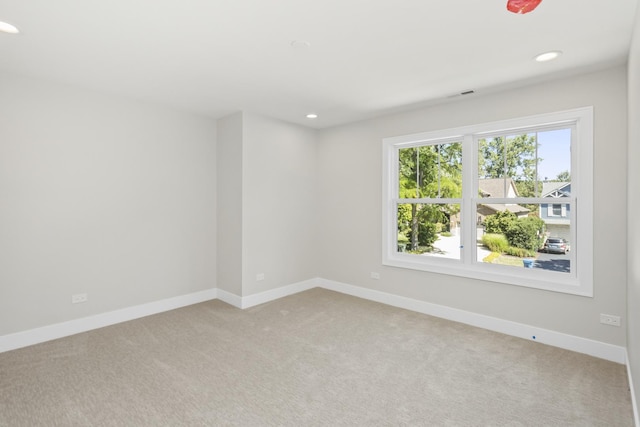 view of carpeted spare room