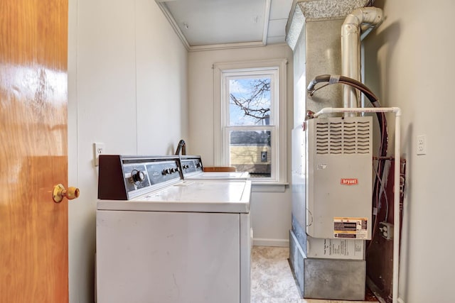 washroom featuring washer and dryer