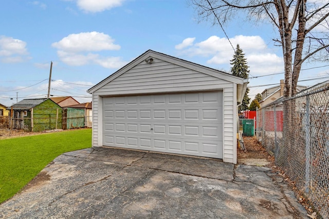 garage featuring a yard