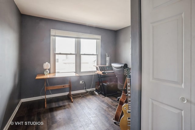 miscellaneous room featuring dark hardwood / wood-style floors