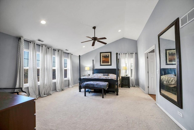 bedroom featuring ceiling fan, lofted ceiling, and light carpet