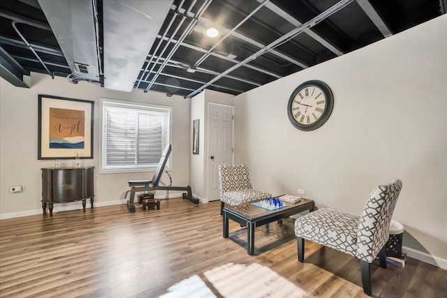 sitting room featuring hardwood / wood-style flooring