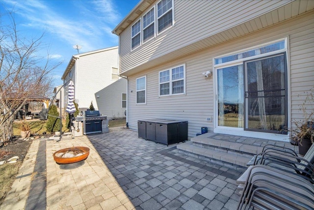 view of patio featuring an outdoor fire pit