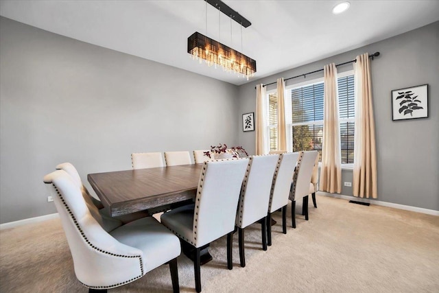 view of carpeted dining room