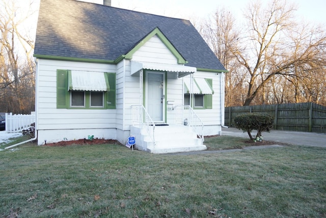 bungalow with a front lawn