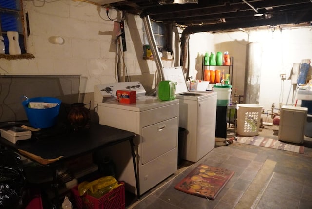 clothes washing area featuring independent washer and dryer