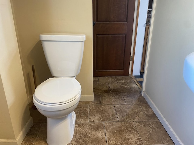 bathroom featuring toilet