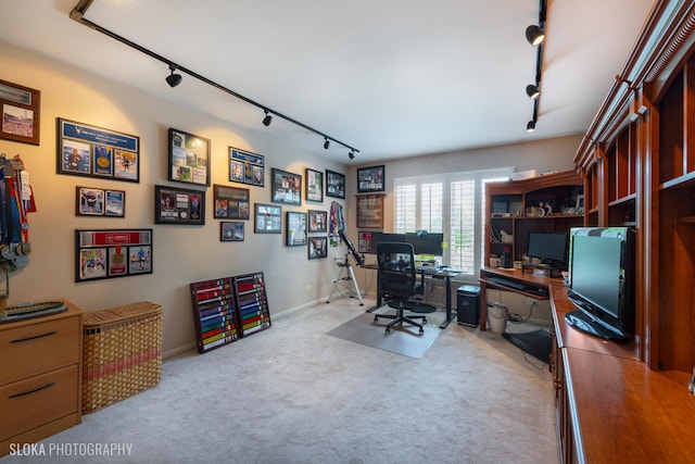 office area featuring light carpet and rail lighting