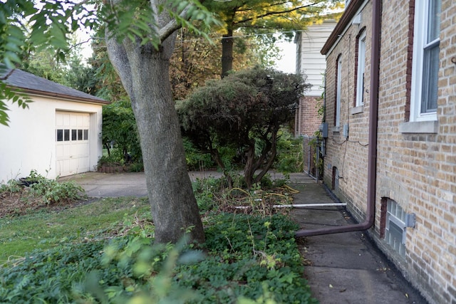 view of yard featuring a garage