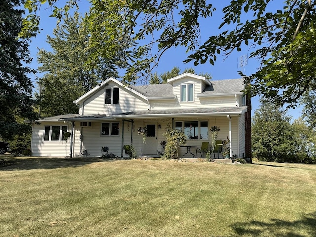 view of front facade with a porch and a front yard