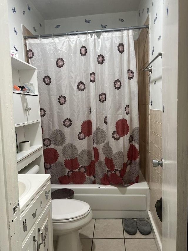 full bathroom with tile patterned flooring, vanity, shower / tub combo, and toilet