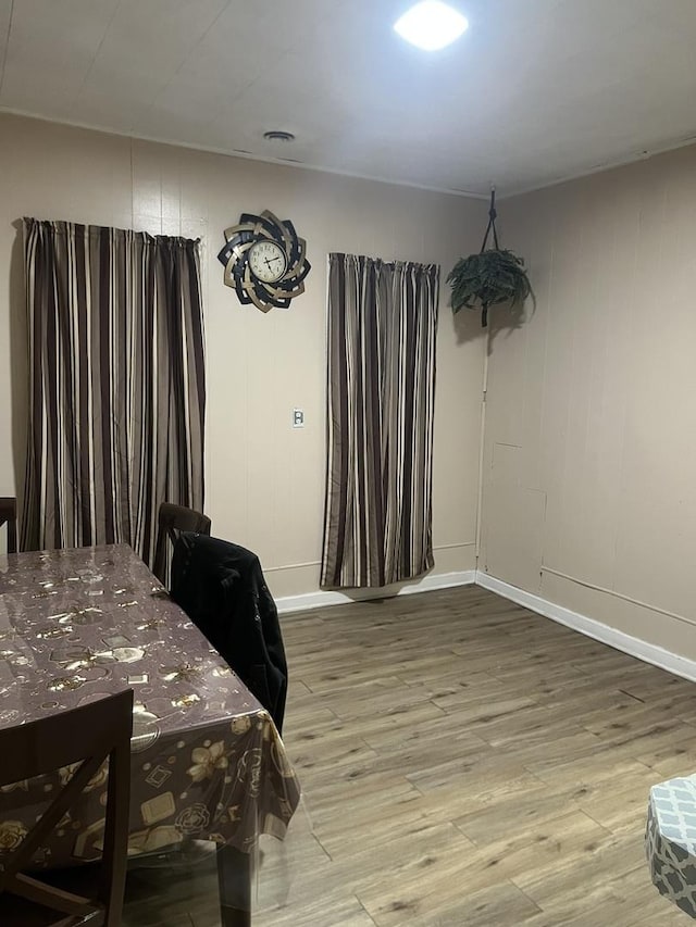 dining room featuring wood-type flooring