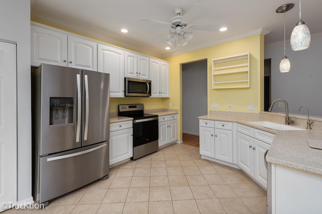 kitchen with appliances with stainless steel finishes, decorative light fixtures, sink, white cabinets, and crown molding