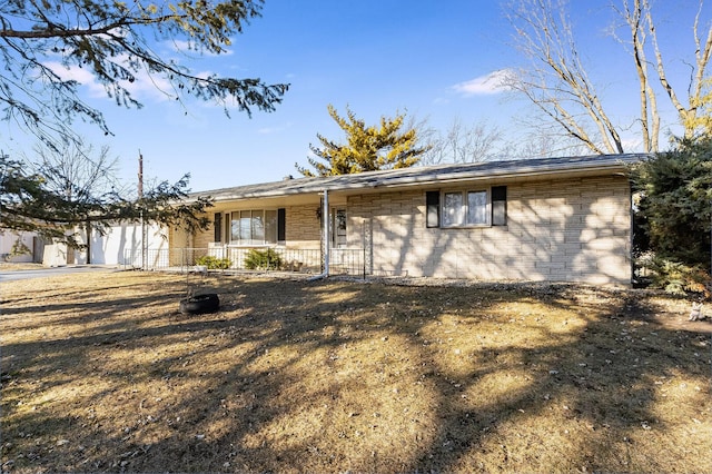 view of front of property with brick siding and covered porch