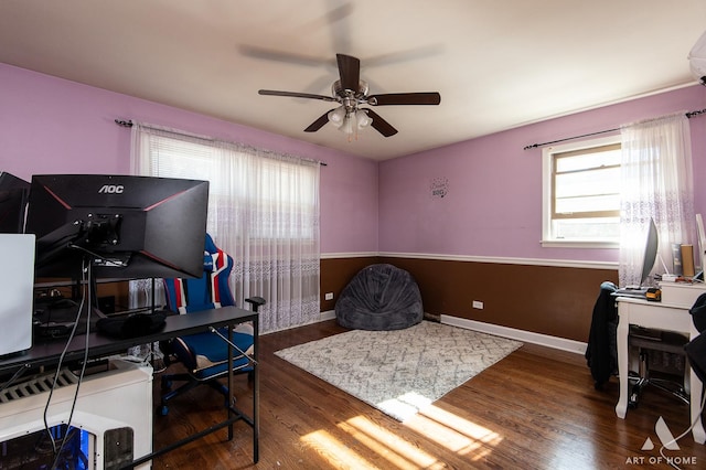 office with a wealth of natural light, dark hardwood / wood-style floors, and ceiling fan