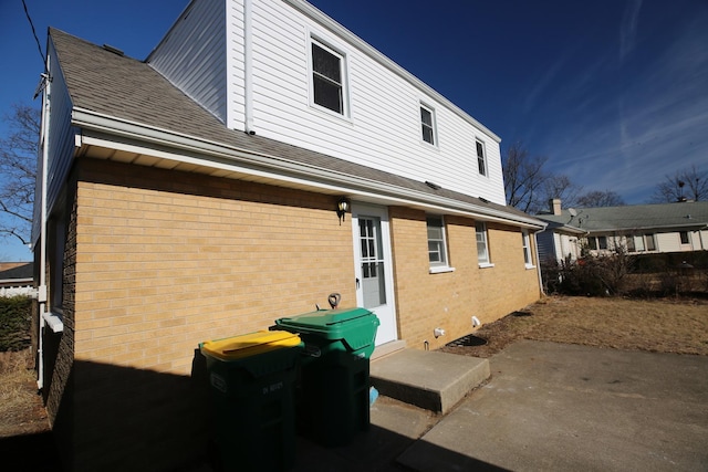 back of property featuring a patio area