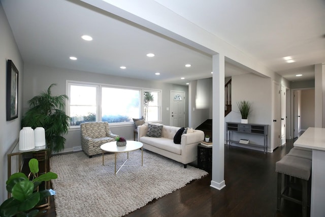 living room featuring dark hardwood / wood-style floors