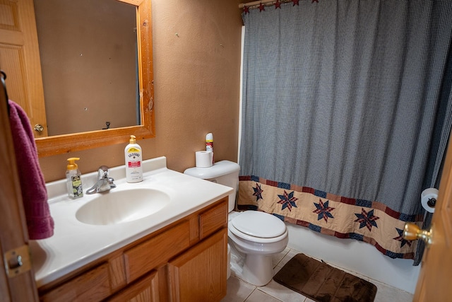 full bathroom featuring shower / bathtub combination with curtain, vanity, toilet, and tile patterned flooring