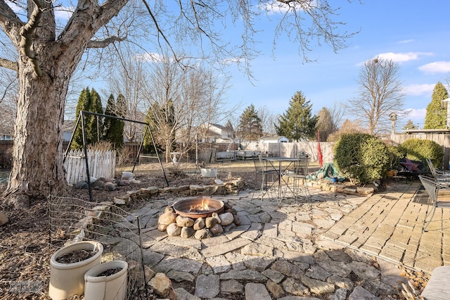 view of patio featuring a fire pit