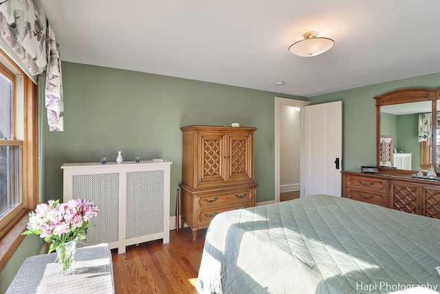 bedroom featuring hardwood / wood-style flooring