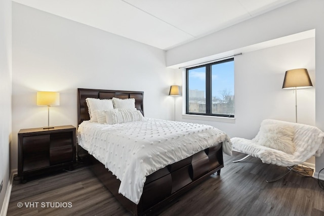 bedroom featuring dark hardwood / wood-style floors