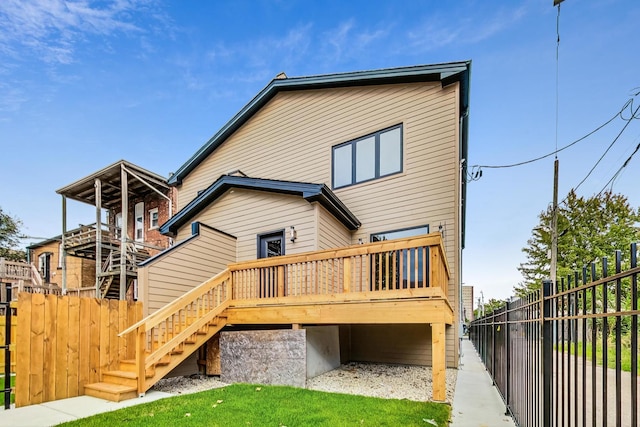 rear view of house with a deck