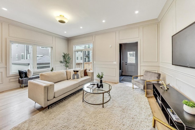 living room with light hardwood / wood-style flooring