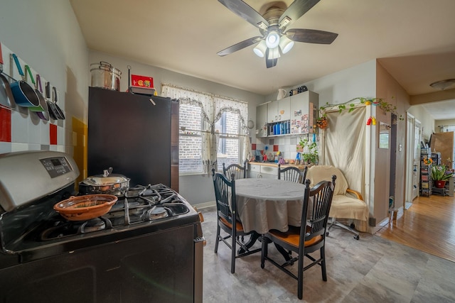 dining space featuring ceiling fan