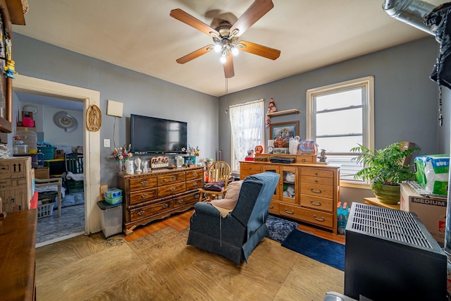 interior space with ceiling fan and light wood-type flooring