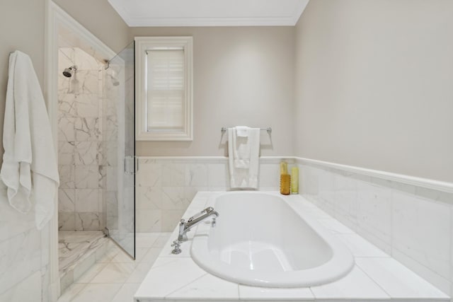 bathroom featuring crown molding and plus walk in shower