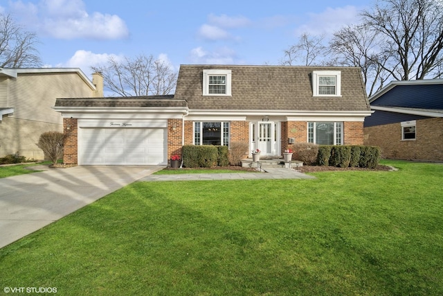 view of front facade with a garage and a front yard