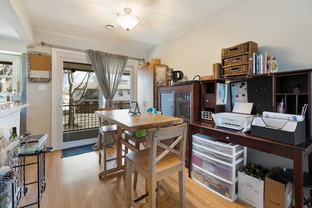 dining room with light hardwood / wood-style flooring