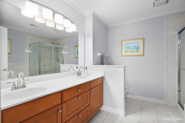 bathroom featuring tile patterned floors, toilet, a shower with shower door, ornamental molding, and vanity