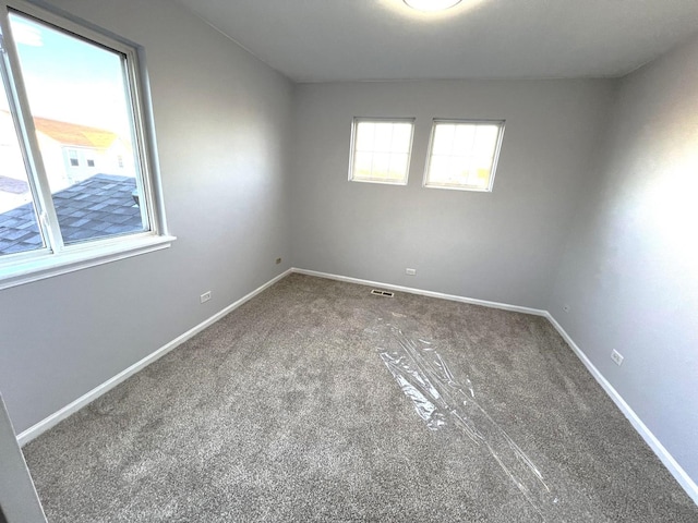 empty room with carpet floors