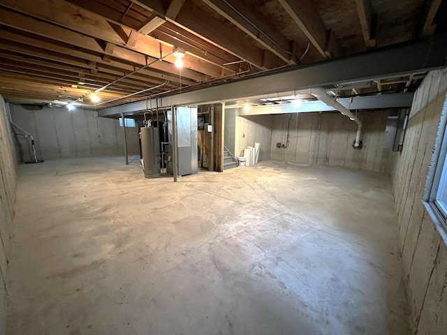 basement with heating unit and gas water heater