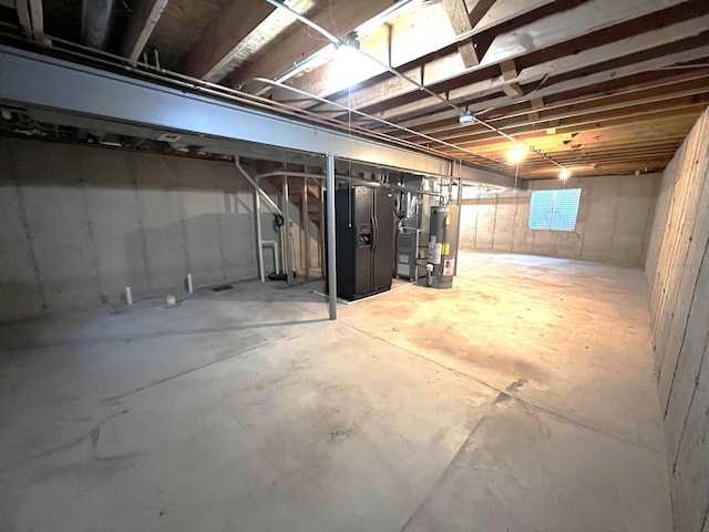 basement featuring water heater