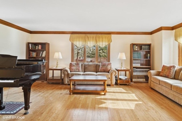 living room with crown molding and light hardwood / wood-style floors