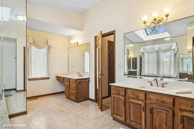 bathroom with vanity and lofted ceiling