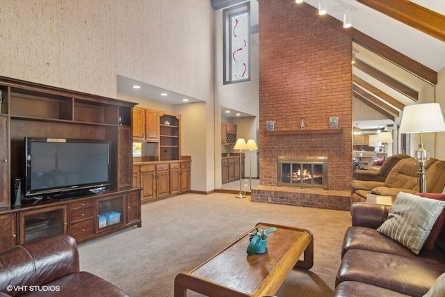 carpeted living room featuring a brick fireplace, high vaulted ceiling, and beamed ceiling