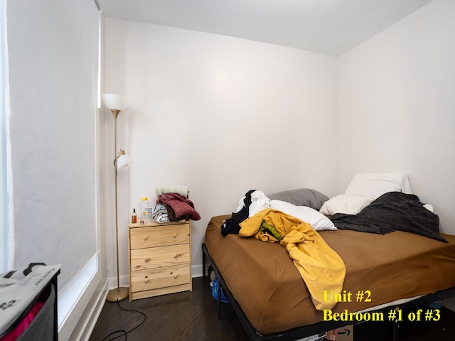 bedroom featuring dark hardwood / wood-style floors